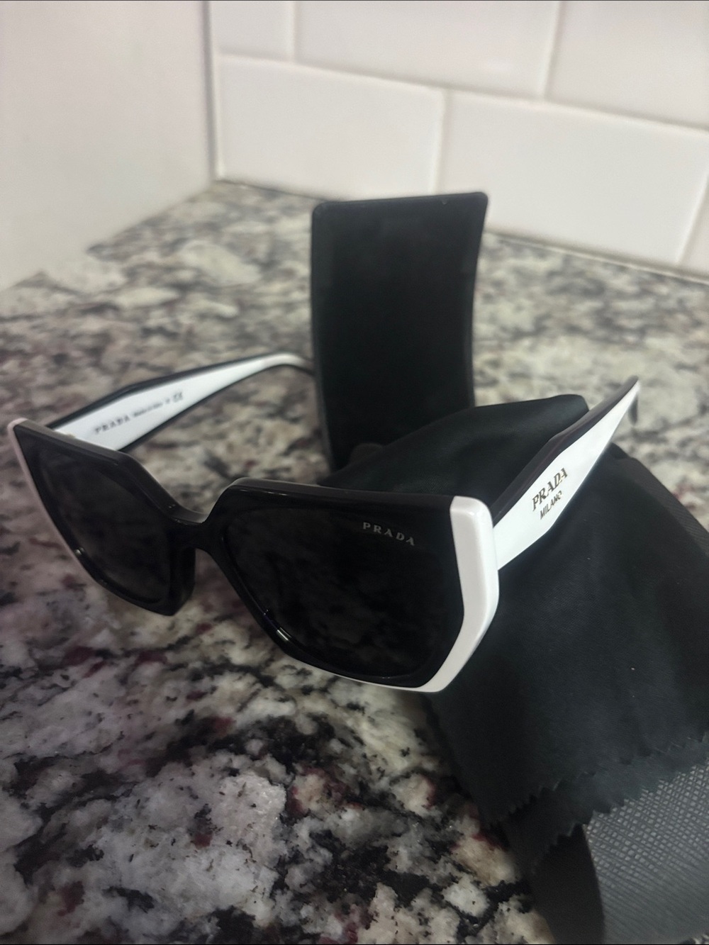 Prada Black Lenses with White Temple Accent Women's Sunglasses